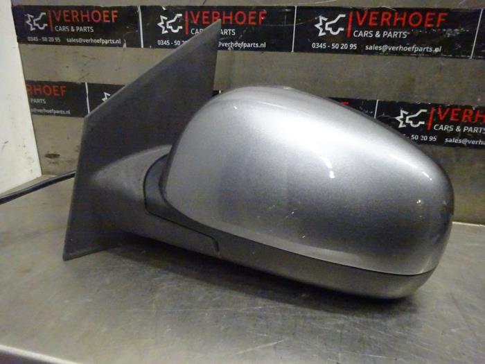 Wing mirror, left from a Nissan Note (E11) 1.4 16V 2011