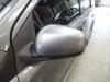 Wing mirror, left from a Nissan Note (E11) 1.4 16V 2011