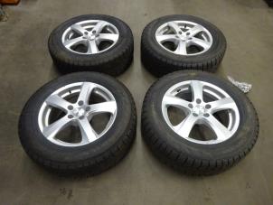 Used Set of sports wheels + winter tyres Mitsubishi Outlander (GF/GG) 2.4 16V PHEV 4x4 Price on request offered by Verhoef Cars & Parts