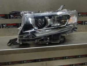 Used Headlight, left Toyota Land Cruiser (J15) 2.8 D-4D 16V Euro 6 Price € 907,50 Inclusive VAT offered by Verhoef Cars & Parts