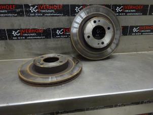 Used Front brake disc Mitsubishi Space Star (A0) 1.2 12V Price on request offered by Verhoef Cars & Parts