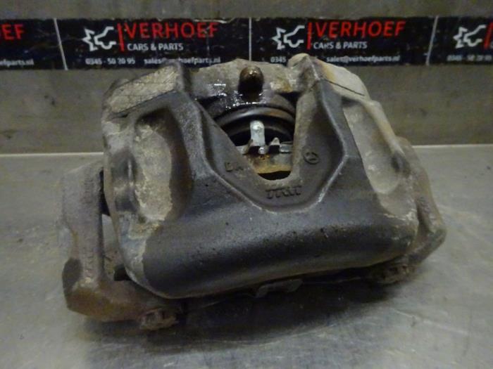 Front brake calliper, left from a Mercedes-Benz E (W212) E-250 CGI 16V BlueEfficiency 2010
