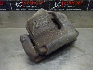 Used Front brake calliper, left Seat Leon (1P1) 1.8 TSI 16V Price on request offered by Verhoef Cars & Parts