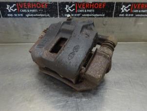 Used Front brake calliper, right Hyundai Accent 1.4i 16V Price on request offered by Verhoef Cars & Parts