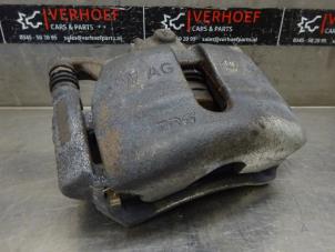 Used Front brake calliper, left Seat Ateca (5FPX) 1.6 TDI 115 Price on request offered by Verhoef Cars & Parts