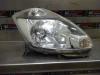 Headlight, right from a Daihatsu Sirion 2 (M3) 1.3 16V DVVT 2008