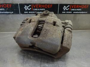 Used Front brake calliper, right Mitsubishi Colt CZC 1.5 16V Price on request offered by Verhoef Cars & Parts