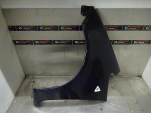 Used Front wing, left Mitsubishi Colt (Z2/Z3) 1.1 12V Price on request offered by Verhoef Cars & Parts