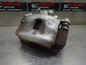 Used Front brake calliper, right Kia Picanto (JA) 1.0 T-GDI 12V Price on request offered by Verhoef Cars & Parts
