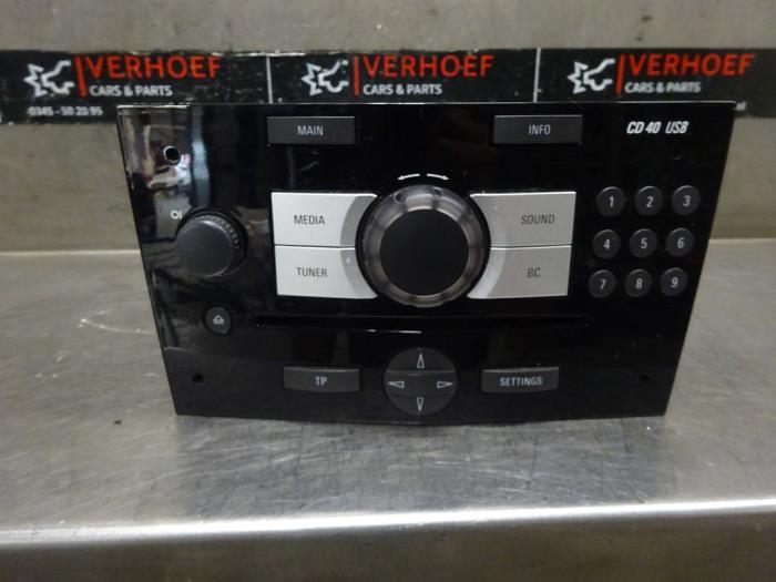 Radio CD player from a Opel Corsa D 1.4 16V Twinport 2014