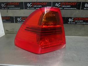 Used Taillight, left BMW 3 serie Touring (E91) 320i 16V Price on request offered by Verhoef Cars & Parts