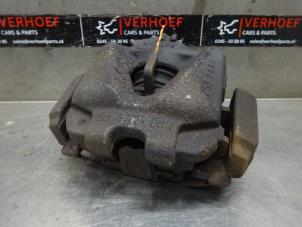 Used Front brake calliper, left BMW 3 serie Touring (E91) 320i 16V Price on request offered by Verhoef Cars & Parts