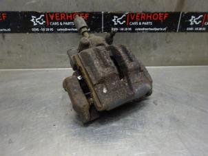 Used Rear brake calliper, left BMW 3 serie Touring (E91) 320i 16V Price on request offered by Verhoef Cars & Parts