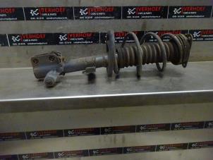 Used Front shock absorber rod, right Renault Clio IV (5R) 0.9 Energy TCE 90 12V Price on request offered by Verhoef Cars & Parts