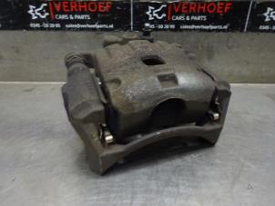 Used Front brake calliper, left Ford Fiesta 6 (JA8) 1.25 16V Price on request offered by Verhoef Cars & Parts