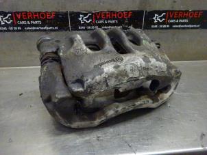 Used Front brake calliper, left Nissan NV 400 (M9J) 2.3 dCi 170 16V Price on request offered by Verhoef Cars & Parts