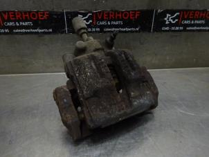Used Rear brake calliper, left BMW 3 serie Touring (E91) 318i 16V Price on request offered by Verhoef Cars & Parts
