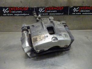Used Front brake calliper, left Hyundai i10 1.0 12V Price on request offered by Verhoef Cars & Parts