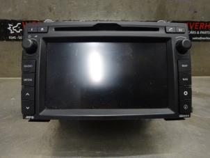 Used Display Multi Media control unit Kia Cee'd Sporty Wagon (EDF) 1.4 16V Price € 400,00 Margin scheme offered by Verhoef Cars & Parts