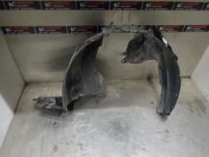 Used Wheel arch liner Nissan Note (E11) 1.4 16V Price € 25,00 Margin scheme offered by Verhoef Cars & Parts