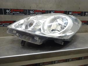 Used Headlight, left Nissan Note (E11) 1.4 16V Price € 80,00 Margin scheme offered by Verhoef Cars & Parts