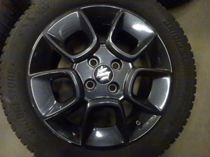 Sport rims set + tires from a Suzuki Ignis (MF) 1.2 Dual Jet 16V 2018