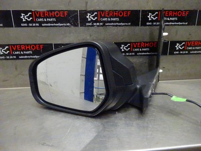 Wing mirror, left from a Ford Transit Courier 1.5 TDCi 75 2020