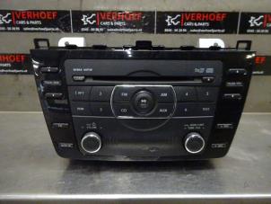 Used Radio CD player Mazda 6 SportBreak (GH19/GHA9) 1.8i 16V Price on request offered by Verhoef Cars & Parts