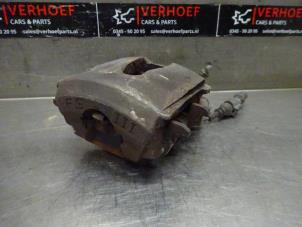 Used Front brake calliper, left Seat Leon (1P1) 1.2 TSI Price on request offered by Verhoef Cars & Parts