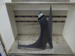Used Front wing, left Honda Insight (ZE2) 1.3 16V VTEC Price on request offered by Verhoef Cars & Parts