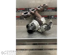 Turbo van een Volkswagen Touran (1T3) 1.6 TDI 16V 2012