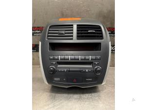 Usagé Panneau commande radio Mitsubishi ASX 1.6 MIVEC 16V Prix € 100,00 Règlement à la marge proposé par Verhoef Cars & Parts
