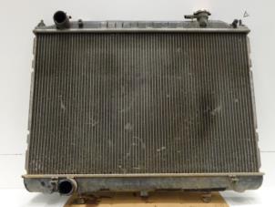 Used Radiator Nissan Navara (D40) 2.5 dCi 16V 4x4 Price on request offered by Verhoef Cars & Parts