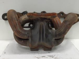 Used Exhaust manifold Ford Focus 1 1.8 16V Price on request offered by Verhoef Cars & Parts