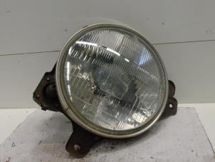 Used Headlight, right Ssang Yong Korando Cabrio (KJ) 2.9 D Price on request offered by Verhoef Cars & Parts