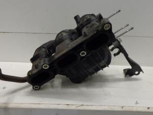 Used Intake manifold Nissan Pixo (D31S) 1.0 12V Price on request offered by Verhoef Cars & Parts