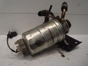 Used Fuel filter housing Mitsubishi Pajero Hardtop (V6/7) 3.2 DI-D 16V Price € 75,00 Margin scheme offered by Verhoef Cars & Parts