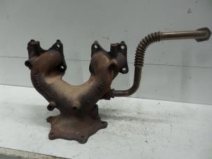 Used Exhaust manifold Nissan Almera (N16) 1.5 16V Price on request offered by Verhoef Cars & Parts