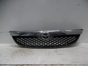 Used Grille Mazda 626 (GF12) 1.8i 16V Price on request offered by Verhoef Cars & Parts