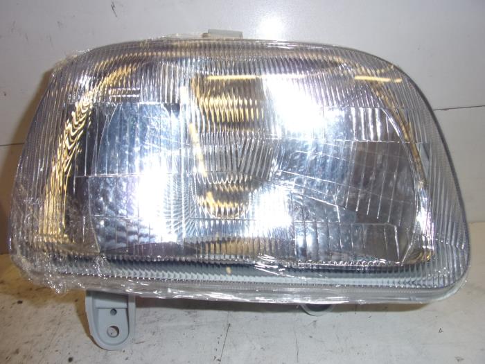 Headlight, right from a Daihatsu Cuore 1994