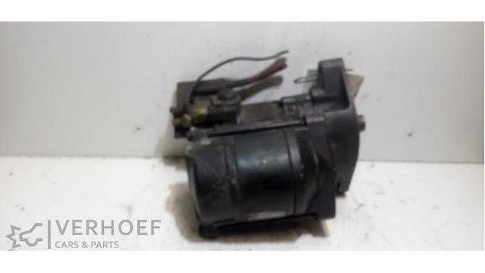 Anlasser van een Chrysler Voyager/Grand Voyager 2.4i 16V 2000