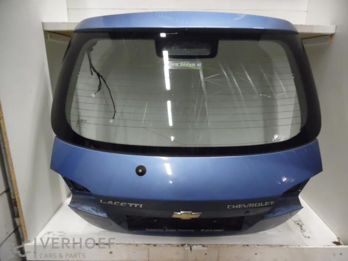 Używane Tylna klapa Chevrolet Lacetti (KLAN) 1.6 16V Cena € 150,00 Procedura marży oferowane przez Verhoef Cars & Parts