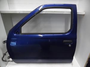 Usagé Portière 2portes gauche Nissan King Cab/Pickup 4x4 (D22) 2.5 TDI 16V Prix € 60,00 Règlement à la marge proposé par Verhoef Cars & Parts