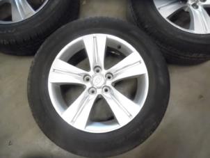 Used Wheel + winter tyre Kia Sportage (SL) 1.6 GDI 16V 4x2 Price on request offered by Verhoef Cars & Parts