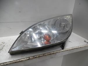 Used Headlight, left Mitsubishi Colt (Z2/Z3) 1.3 16V Price € 40,00 Margin scheme offered by Verhoef Cars & Parts
