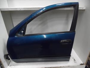 Używane Drzwi lewe przednie wersja 4-drzwiowa Nissan Almera (N16) 1.8 16V Cena € 75,00 Procedura marży oferowane przez Verhoef Cars & Parts