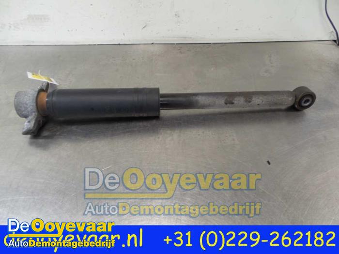 Rear shock absorber, left from a Opel Astra J Sports Tourer (PD8/PE8/PF8) 1.3 CDTI 16V ecoFlex 2012