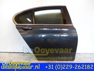 Used Rear door 4-door, right BMW 7 serie (F01/02/03/04) 740d xDrive 24V Price € 225,00 Margin scheme offered by Autodemontagebedrijf De Ooyevaar
