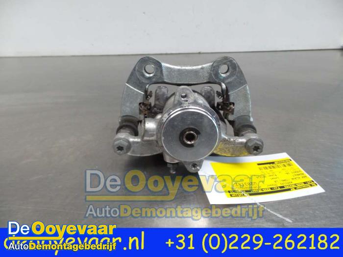Rear brake calliper, left from a Renault Scénic IV (RFAJ) 1.6 Energy dCi 160 EDC 2018