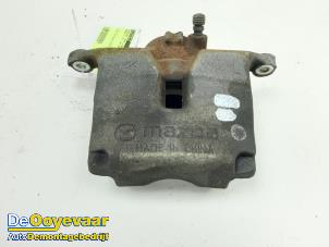 Used Front brake calliper, left Mazda 3 (BM/BN) 2.0 SkyActiv-G 16V Price € 44,99 Margin scheme offered by Autodemontagebedrijf De Ooyevaar